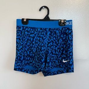 Blue and black Nike pro shorts